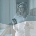 Woman walking down a school corridor